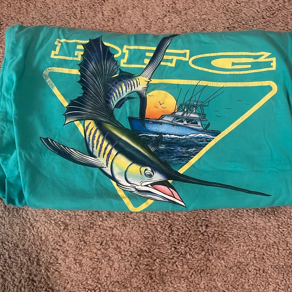 teal PGF shirt